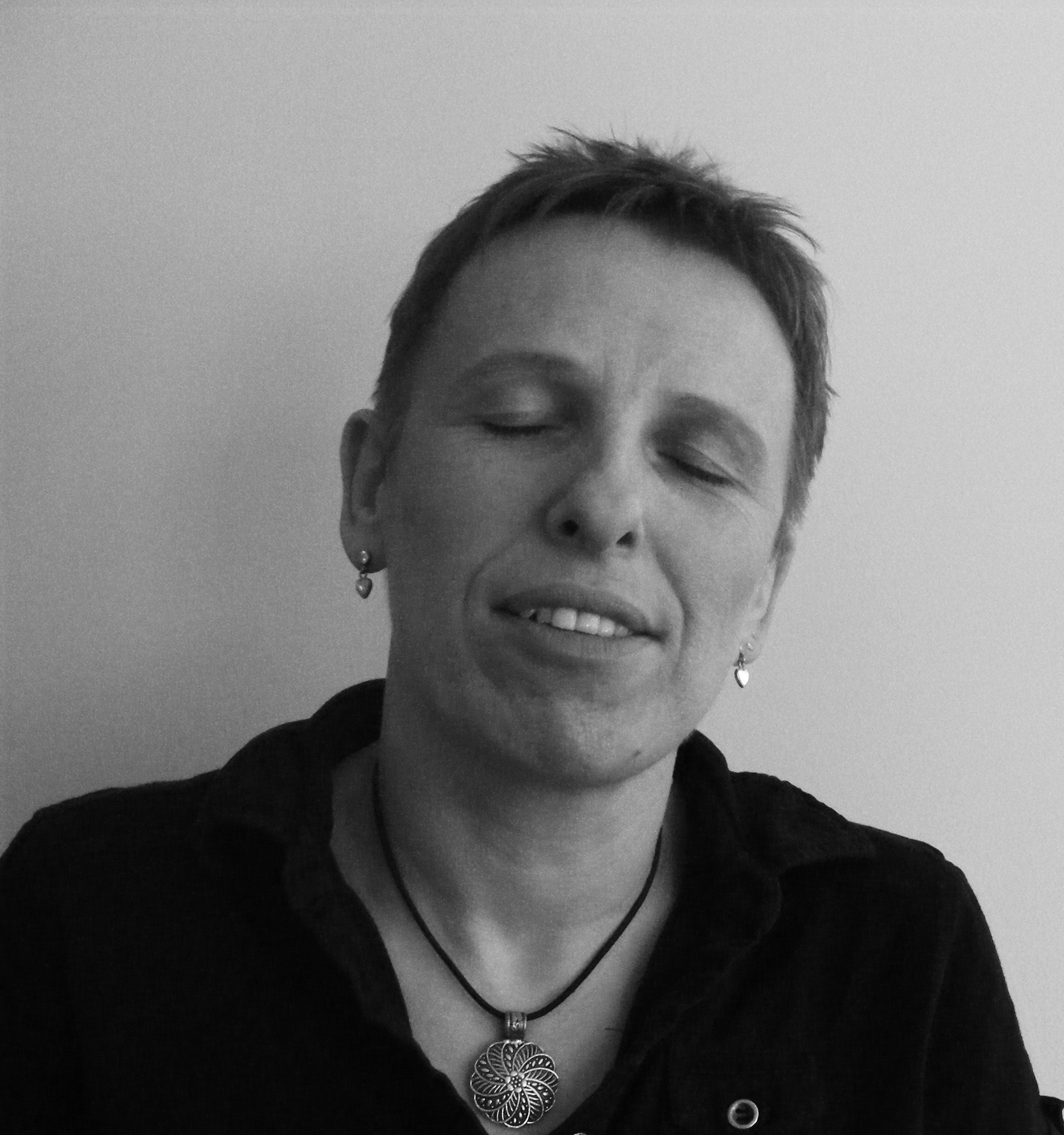 Poet, writer, editor Jackson with eyes shut