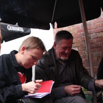 Writer Jackson signing a book