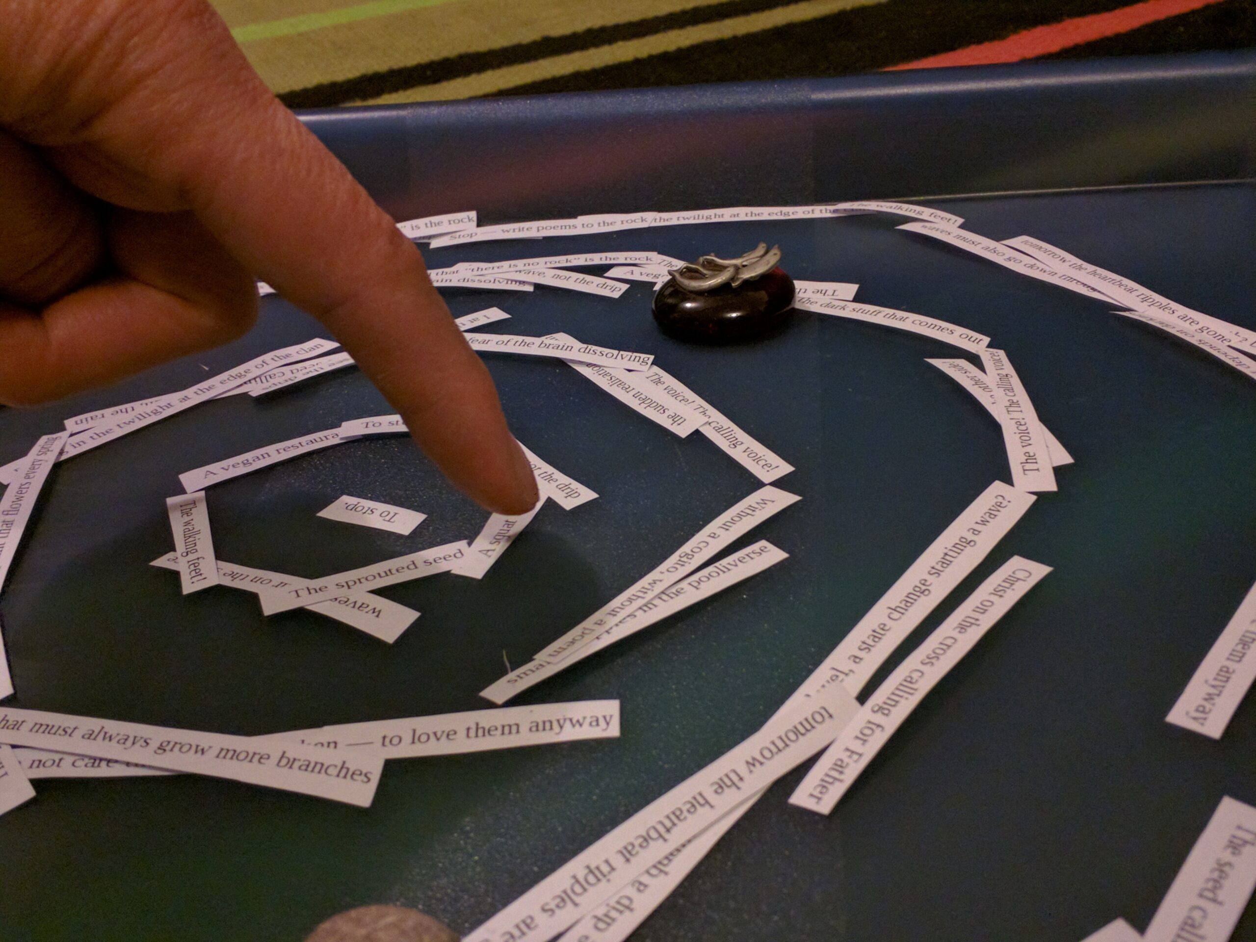 'Finger of God" arranging ripples of poem about Gödel's theorem