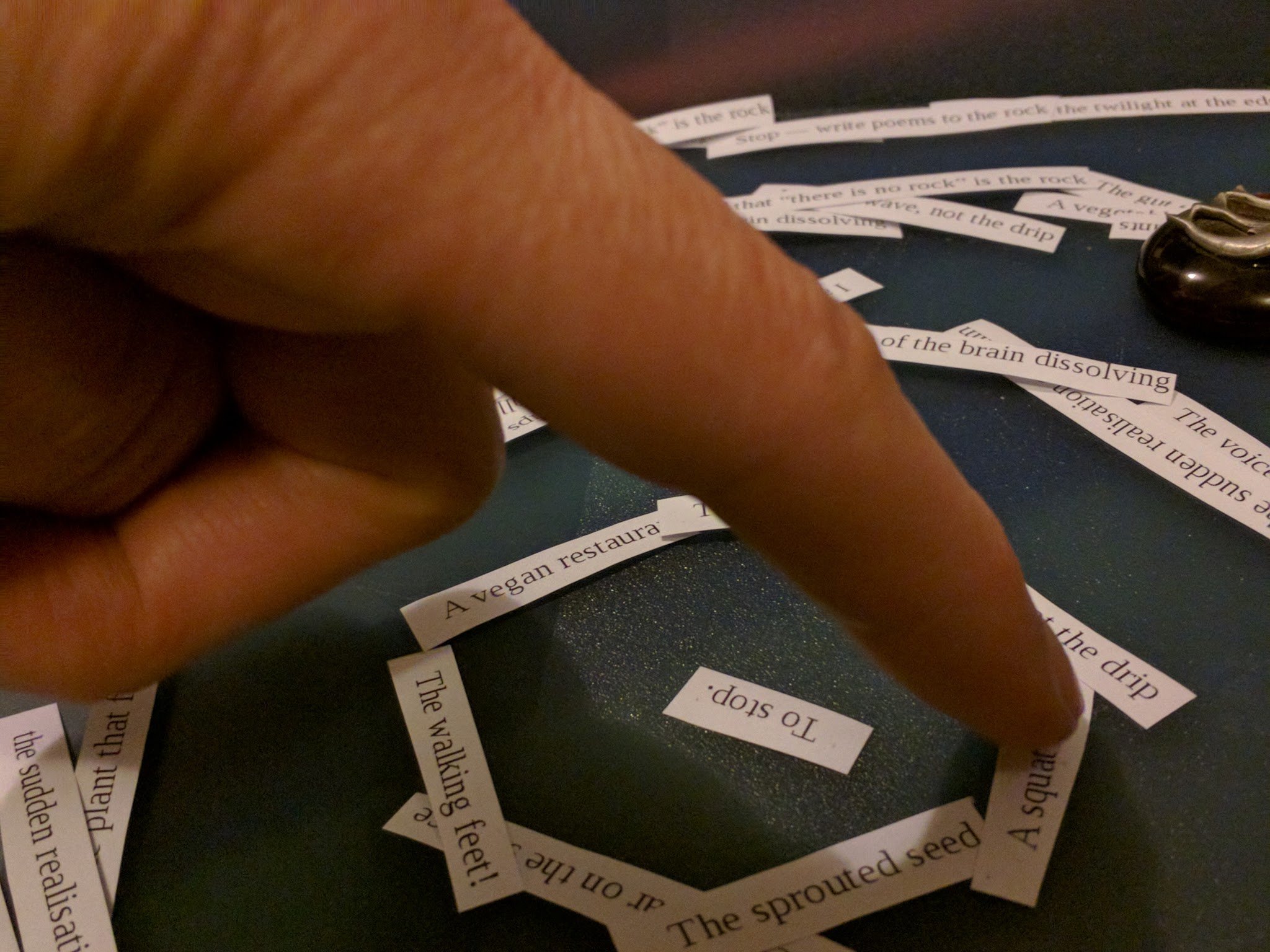 'Finger of God" arranging lines of poem about Gödel's theorem